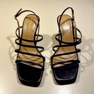 Black strappy sandles  like new. 3” heal
